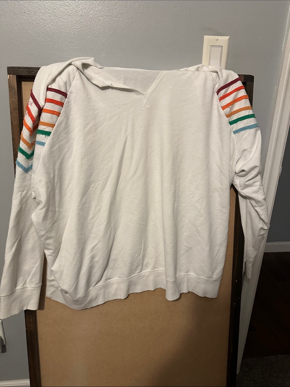 Maurices White Sweatshirt with Rainbow Stripe Sleeve Detail